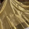 Nita Ambani Mam Golden Embossed Tissue Silk Saree